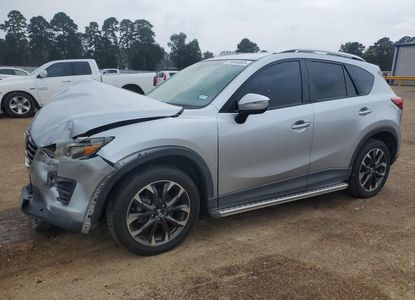 تقرير المركبة لـ VIN JM3KE2DY3G0742402 - الصورة 1