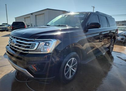 Vehicle Report for VIN 1FMJK1HT1KEA58669 - Image 1