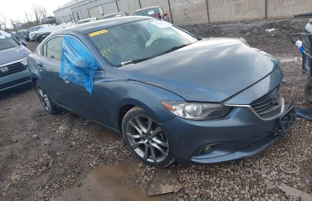 Informe del vehículo para VIN JM1GJ1W56E1111352 - Imagen 1