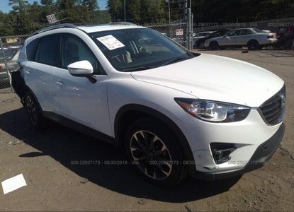 تقرير المركبة لـ VIN JM3KE4DY9G0815249 - الصورة 1