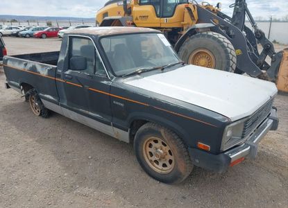 تقرير المركبة لـ VIN JM2UC1219E0897889 - الصورة 1