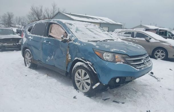 Raport pojazdu dla VIN 5J6RM4H57EL027666 - Obraz 1