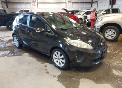 Vehicle Report for VIN 3FADP4EJ9DM118708 - Image 1