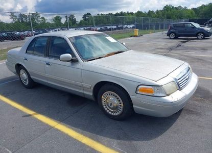 Vehicle Report for VIN 2FAFP73W3YX155269 - Image 1