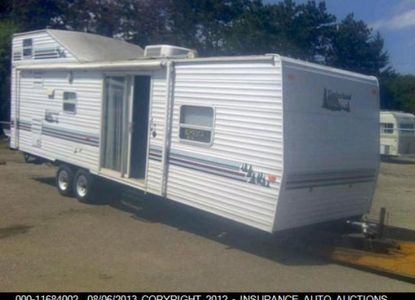 Vehicle Report for VIN 5C1TR32291P001214 - Image 1