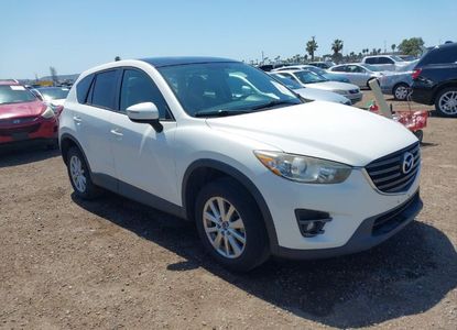 Vehicle Report for VIN JM3KE4CY7G0687952 - Image 1