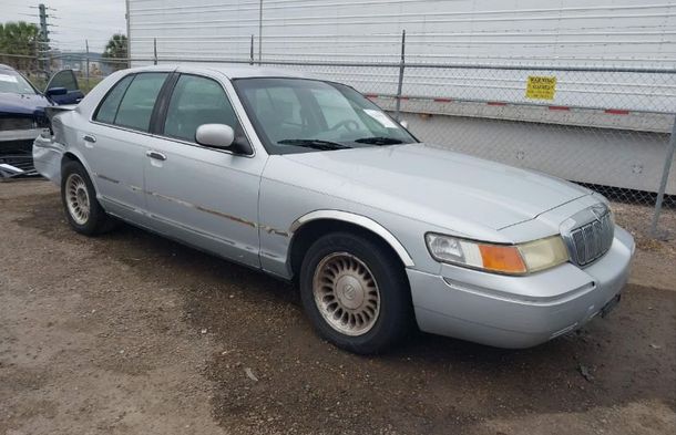 Raport pojazdu dla VIN 2MEFM75W3YX661361 - Obraz 1