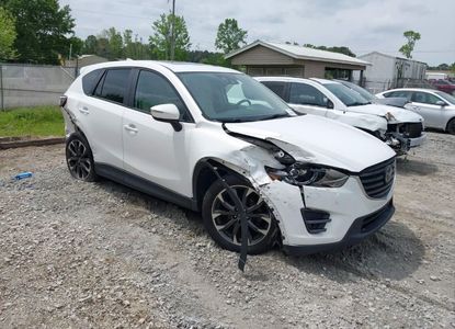 تقرير المركبة لـ VIN JM3KE4DY7G0746352 - الصورة 1