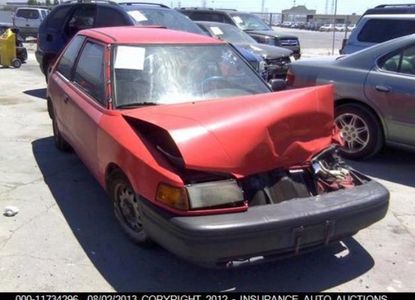 Raport vehicul pentru VIN JM1BG2329L0189409 - Imaginea 1