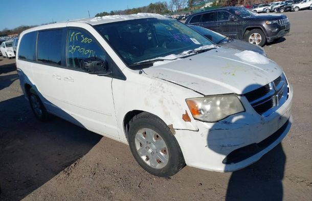 Informe del vehículo para VIN 2D4RN4DG8BR647717 - Imagen 1