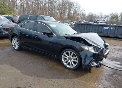 Vehicle Report for VIN JM1GL1V52H1142842 - Image 1