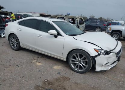 Vehicle Report for VIN JM1GJ1W61E1145319 - Image 1