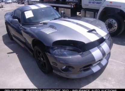 Raport pojazdu dla VIN 1B3ER69EX2V102569 - Obraz 1