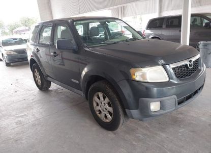 Informe del vehículo para VIN 4F2CZ02Z58KM22554 - Imagen 1