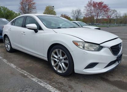 Vehicle Report for VIN JM1GJ1V59E1109421 - Image 1