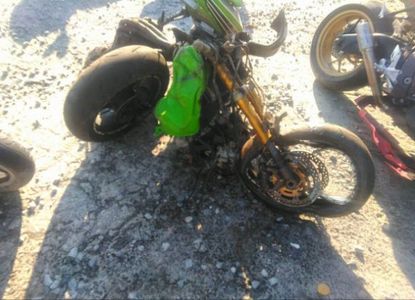 تقرير المركبة لـ VIN JKAZX4M164A000530 - الصورة 1